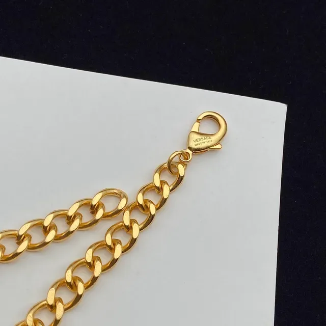 Versace Medusa ক্রিস্টাল পেভে গোল্ড টোন হার 6