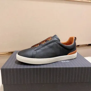Zegna काले भूरे चमड़े के ऊपरी स्लिप-ऑन लाइफस्टाइल स्नीकर