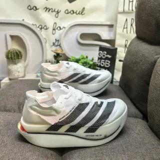 Adidas chaussures de course blanches et noires avec upper en maille engineered perforée Three Stripes