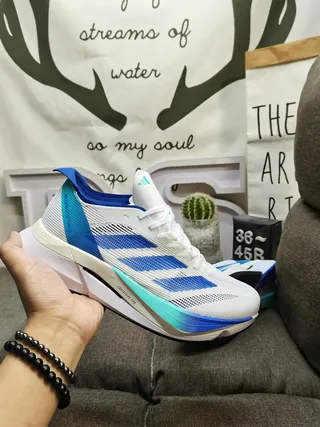 Adidas Blanc Bleu Haut en Maille Ingénierée Trois Rayures Côté Marquage Chaussures de Course 5
