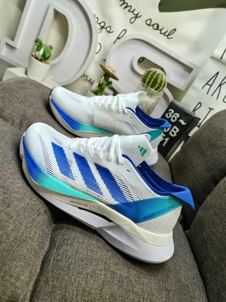 Adidas Blanc Bleu Haut en Maille Ingénierée Trois Rayures Côté Marquage Chaussures de Course 7