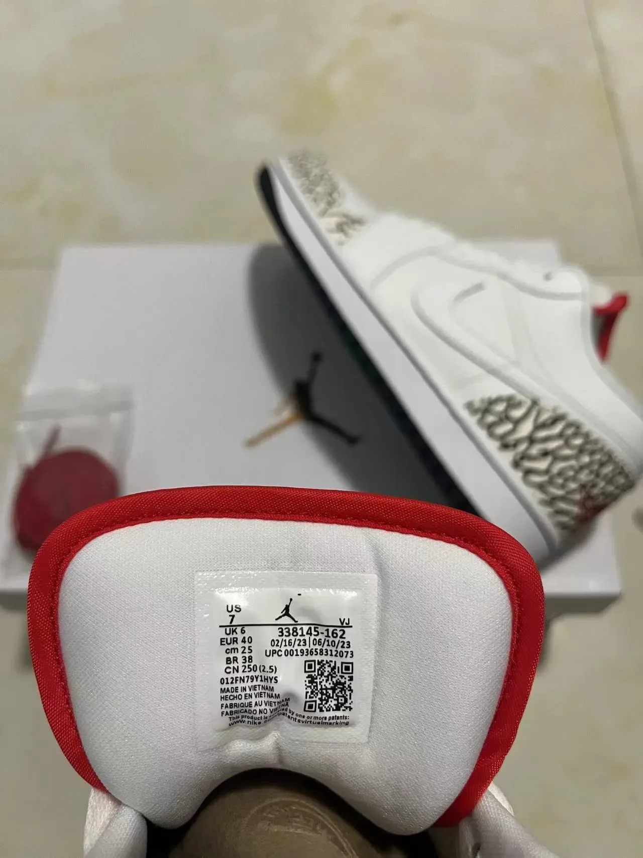 Air Jordan 1 Low Elephant Print Blanco Negro Rojo Zapatillas Lifestyle 9