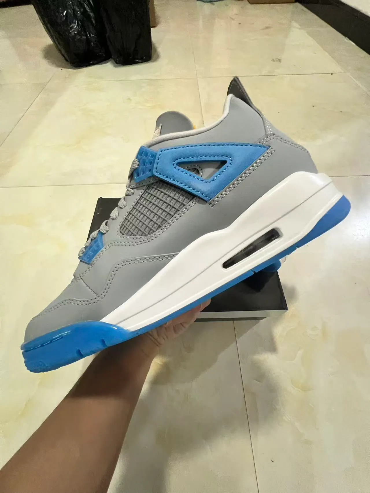حذاء كرة السلة Air Jordan 4 رمادي أزرق أبيض 5