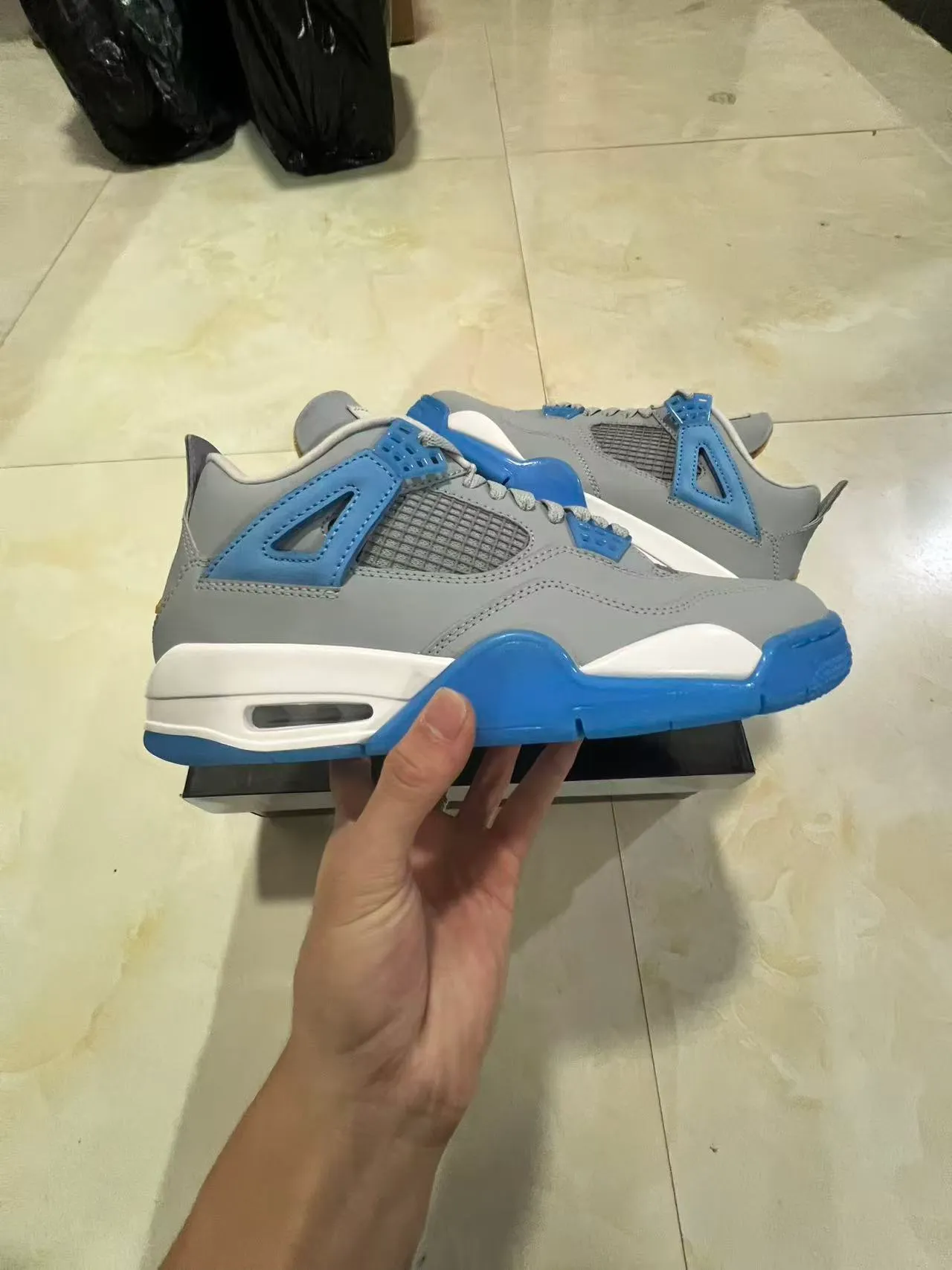 حذاء كرة السلة Air Jordan 4 رمادي أزرق أبيض 7