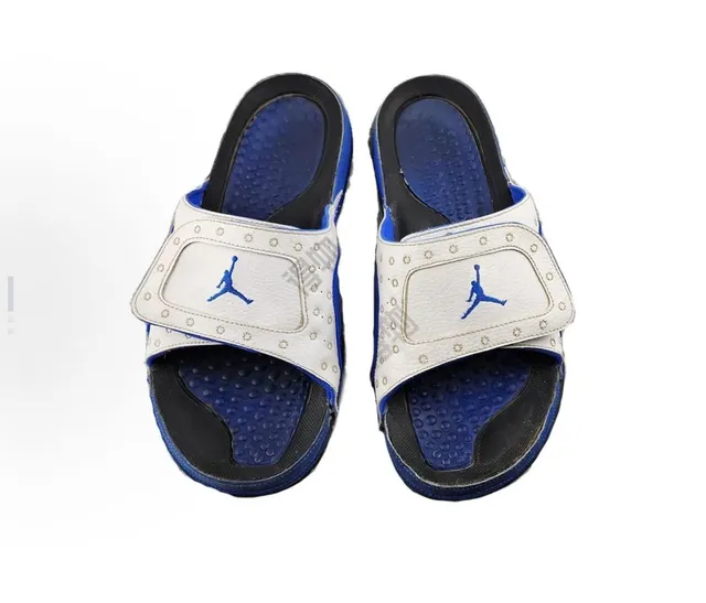 Chinelos Air Jordan bege e azul com logo Jumpman bordado e palmilha de gel texturizada 3