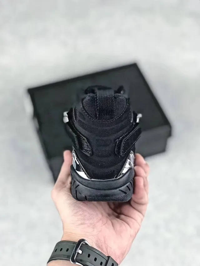 Chaussures de basketball montantes Air Jordan noir et gris à fermeture à double sangle 10