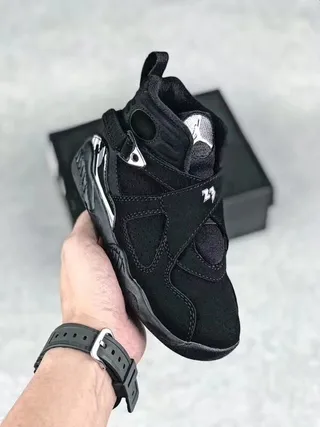 Chaussures de basketball montantes Air Jordan noir et gris à fermeture à double sangle 12