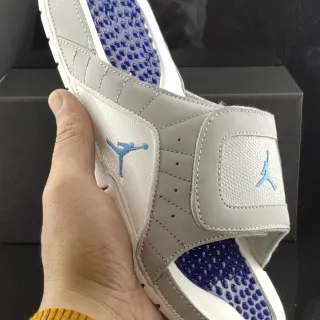 Chanclas Air Jordan Slide gris claro y azul