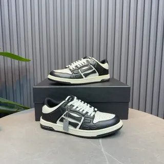 Amiri Skel Top Low zapatillas lifestyle en negro y blanco