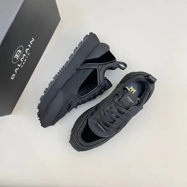 Balmain Sneakers noires monocromatiques en panneaux synthétiques et velours superposés 7