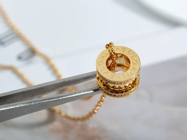Bvlgari B.zero1 Rotating Triple-Ring Gold and Pavé Necklace 3