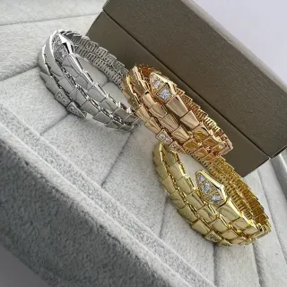 Bvlgari Serpenti चांदी सोने की रंग की घुंसी सांप संयुक्त स्केल लिंक्स हाथ की चूड़ी