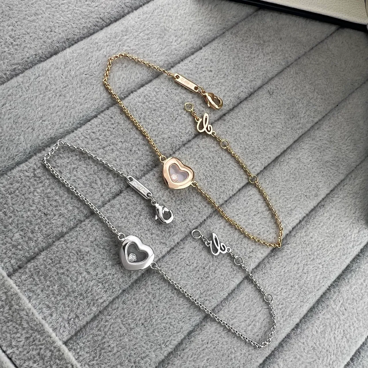 Chopard 快乐心金银心形镂空吊坠浮动钻石手链 7