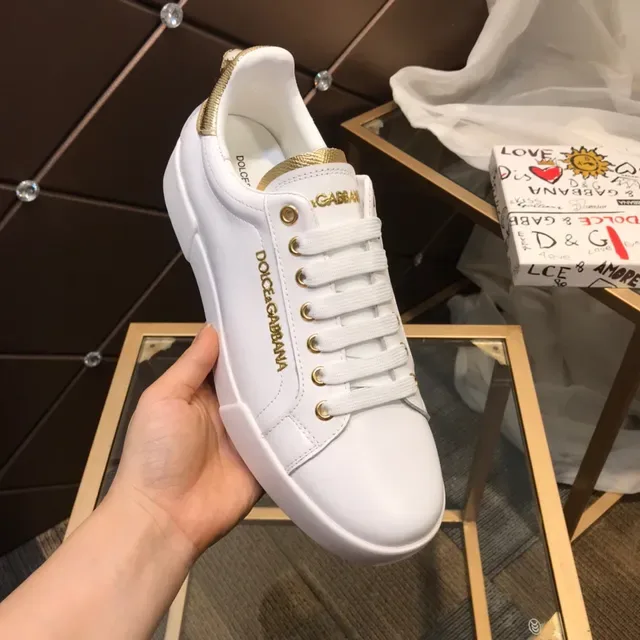 Dolce & Gabbana Portofino حذاء رياضي أبيض وذهبي نمط حياة 2