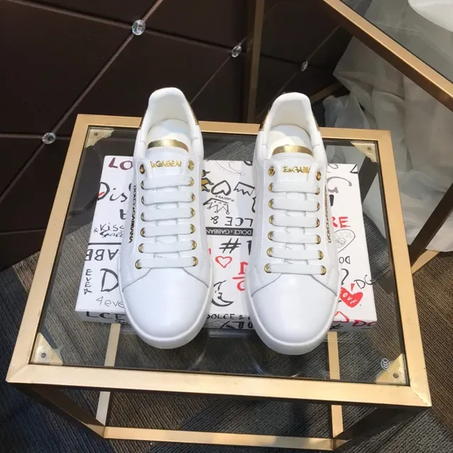 Dolce & Gabbana Portofino حذاء رياضي أبيض وذهبي نمط حياة 9