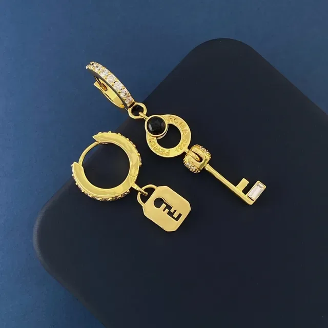 Fendi Lock & Key Boucles d'oreilles asymétriques en cristal et ónix doré 4