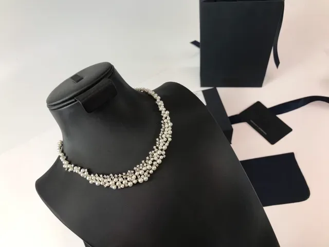 APM Monaco Multi-Strand Pearl and Star Motif Necklace 4