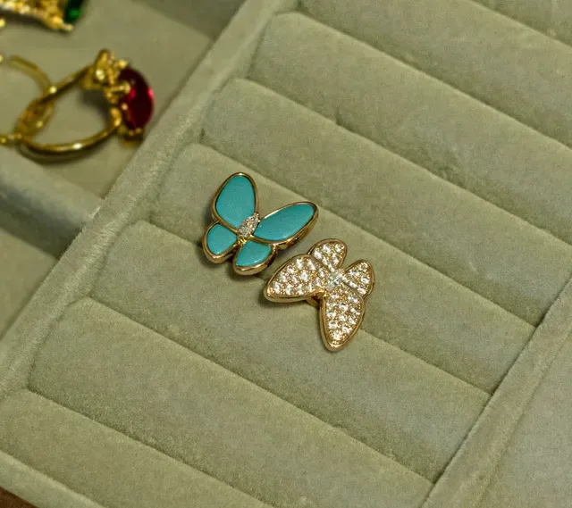 Bagues motif papillon pavé cristal et émail turquoise 8
