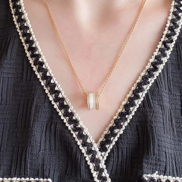 Cylindrical Black and Silver Pendant Necklace 9