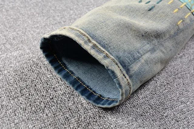 Jeans déchirés patchwork brodés bleu lavé clair 3