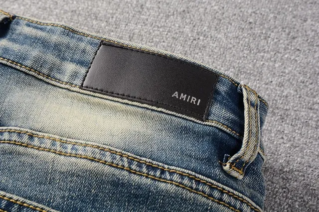 Jeans déchirés patchwork brodés bleu lavé clair 4
