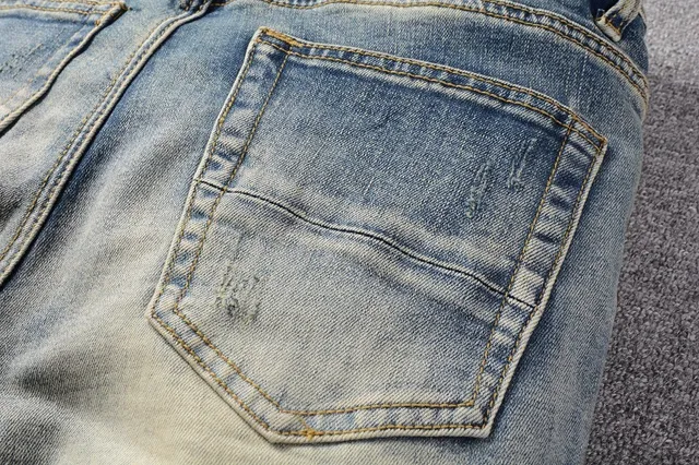 Jeans déchirés patchwork brodés bleu lavé clair 6