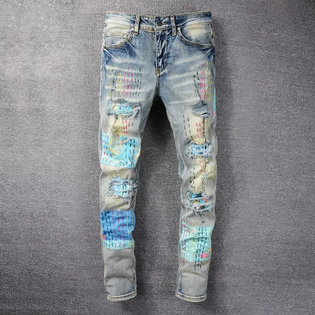 Jeans déchirés patchwork brodés bleu lavé clair 19