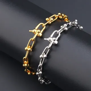 Pulseras de cadena gruesa con acentos de bola en oro y plata