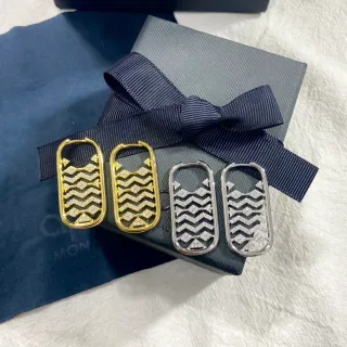 Aretes de aro en tono dorado y plateado, geométricos con ondas y cristales pavé