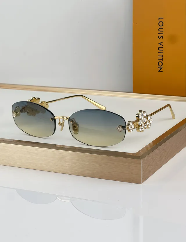 Gafas de sol doradas marrones sin marco con motivo decorativo recortado 2