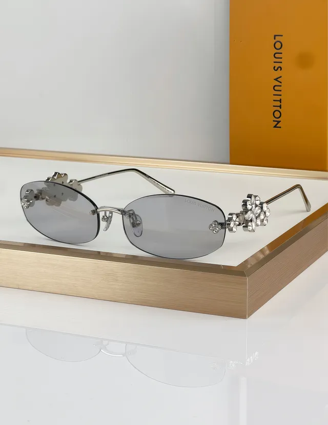 Gafas de sol doradas marrones sin marco con motivo decorativo recortado 3