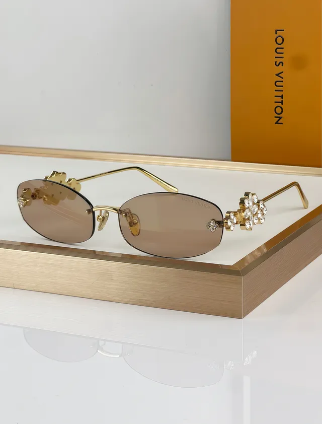 Gafas de sol doradas marrones sin marco con motivo decorativo recortado 5