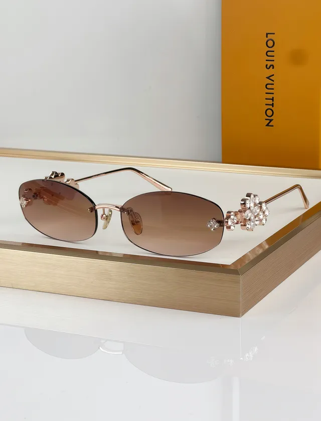 Gafas de sol doradas marrones sin marco con motivo decorativo recortado 6