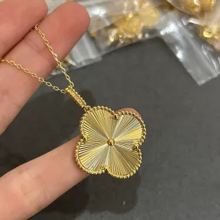 Gold Four-Leaf Clover Sunburst Pendant Necklace