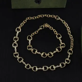 Collier métallique avec chaîne Horsebit-Link en or et argent