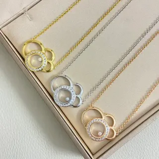 Collier avec pendentif d'anneau interlock en or et argent avec cristaux pavé-set