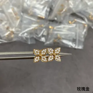 Brincos de flor pavé de tom dourado