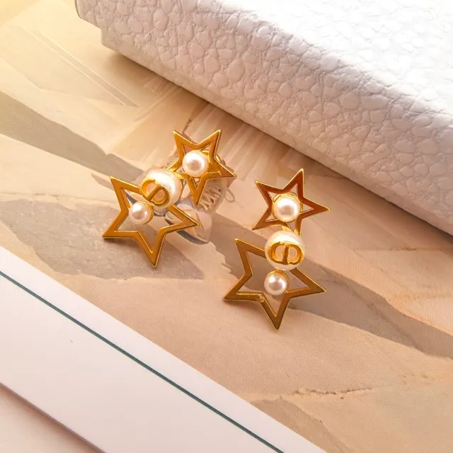 Boucles d'oreilles perles contour étoile ton doré 5