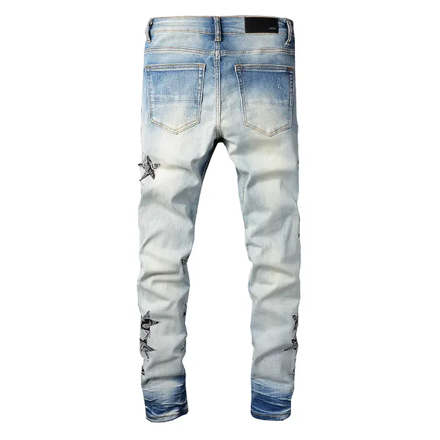 Light-Wash Distressed Star-Print Slim-Fit Jeans 8