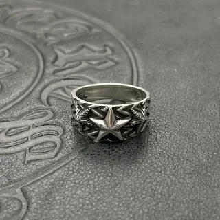 Bague large en argent oxydé au motif étoile et feuille