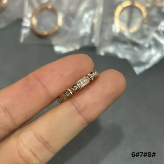 গোলাপি সোনার টোন চ্যানেল সেট পাভে রিং