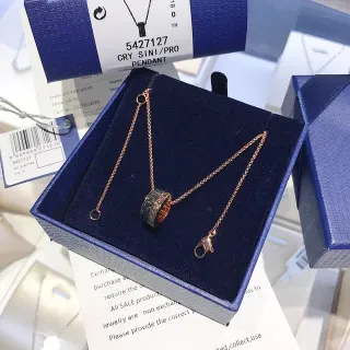 Rose Gold-Tone Rotating Black Ring Pendant Necklace