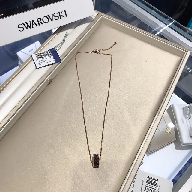 Rose Gold-Tone Rotating Black Ring Pendant Necklace 3