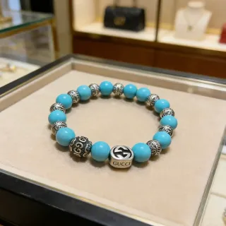 Gucci سوار خرز تركواز وفضي interlocking G