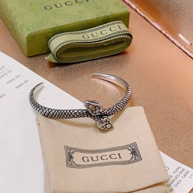 Gucci Pulsera con motivo de serpiente en plata y dorado 5