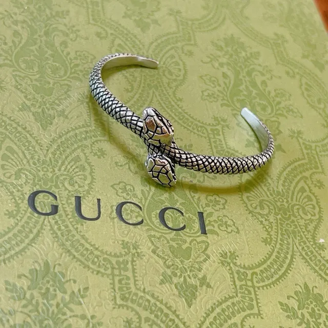 Gucci Pulsera con motivo de serpiente en plata y dorado 6