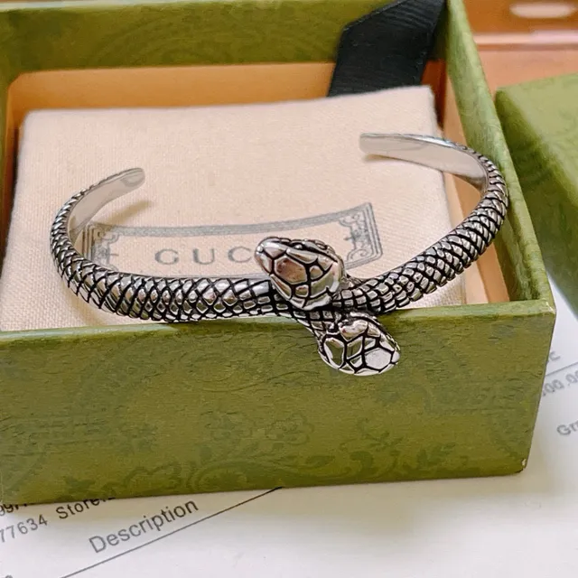 Gucci Pulsera con motivo de serpiente en plata y dorado 8