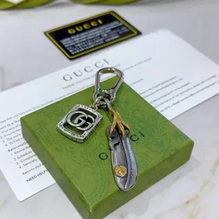 Gucci فضي ذهبي معدني ثنائي اللون GG Logo سوار تشارم