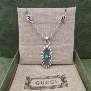 Gucci Silver-Toned Turquoise Sunburst Pendant Necklace