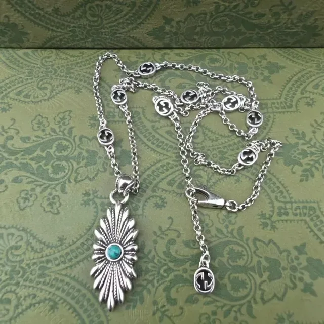 Gucci Silver-Toned Turquoise Sunburst Pendant Necklace 4